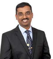 Dr Praveen